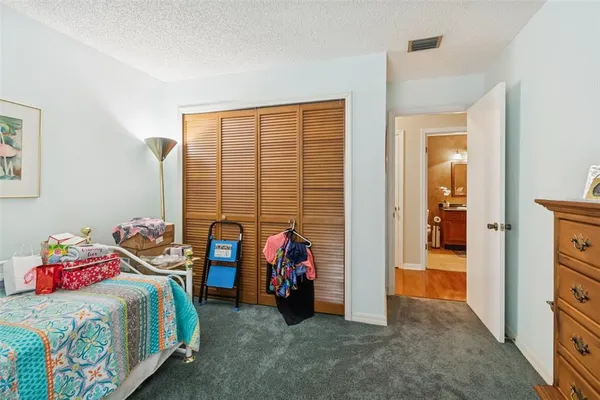 a bathroom with a sink toilet and mirror
