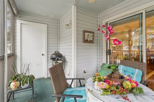a view of a swimming pool with a patio