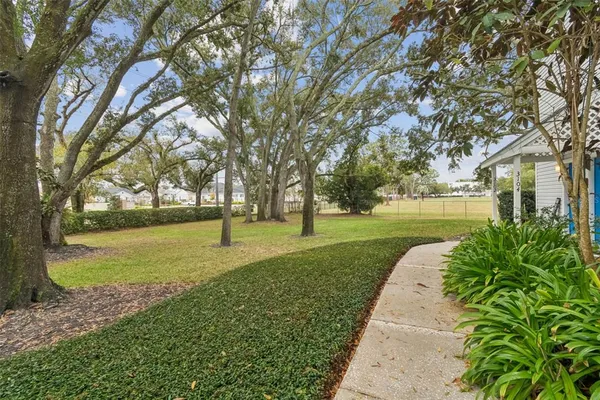 a view of a car park in front of house