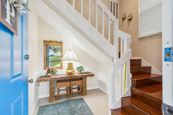 a view of entryway with a front door