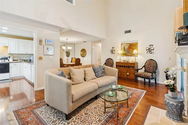 a living room with furniture and a table