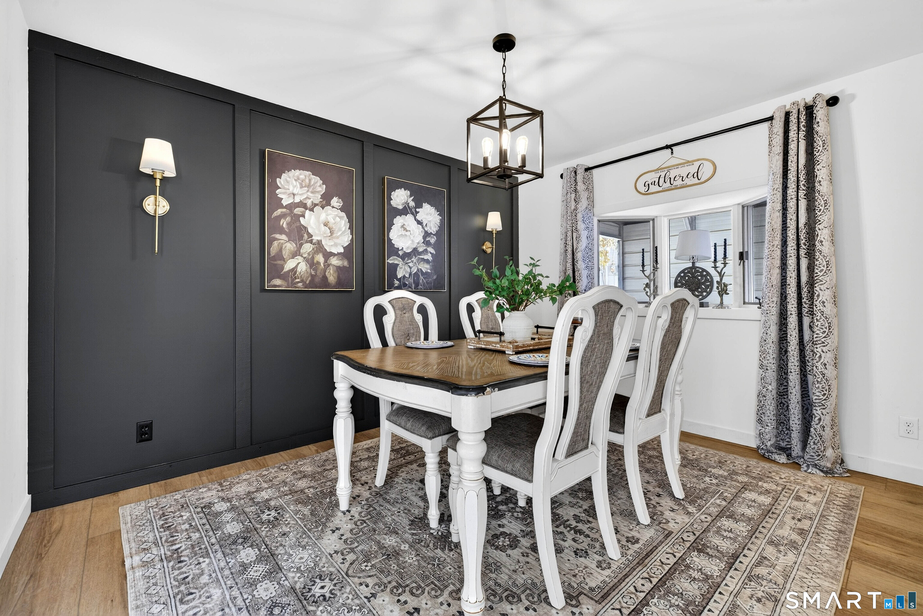 168 Park Avenue Colchester, CT 06415 - Photo 20 of 40 a view of a dining room with furniture a chandelier and wooden floor