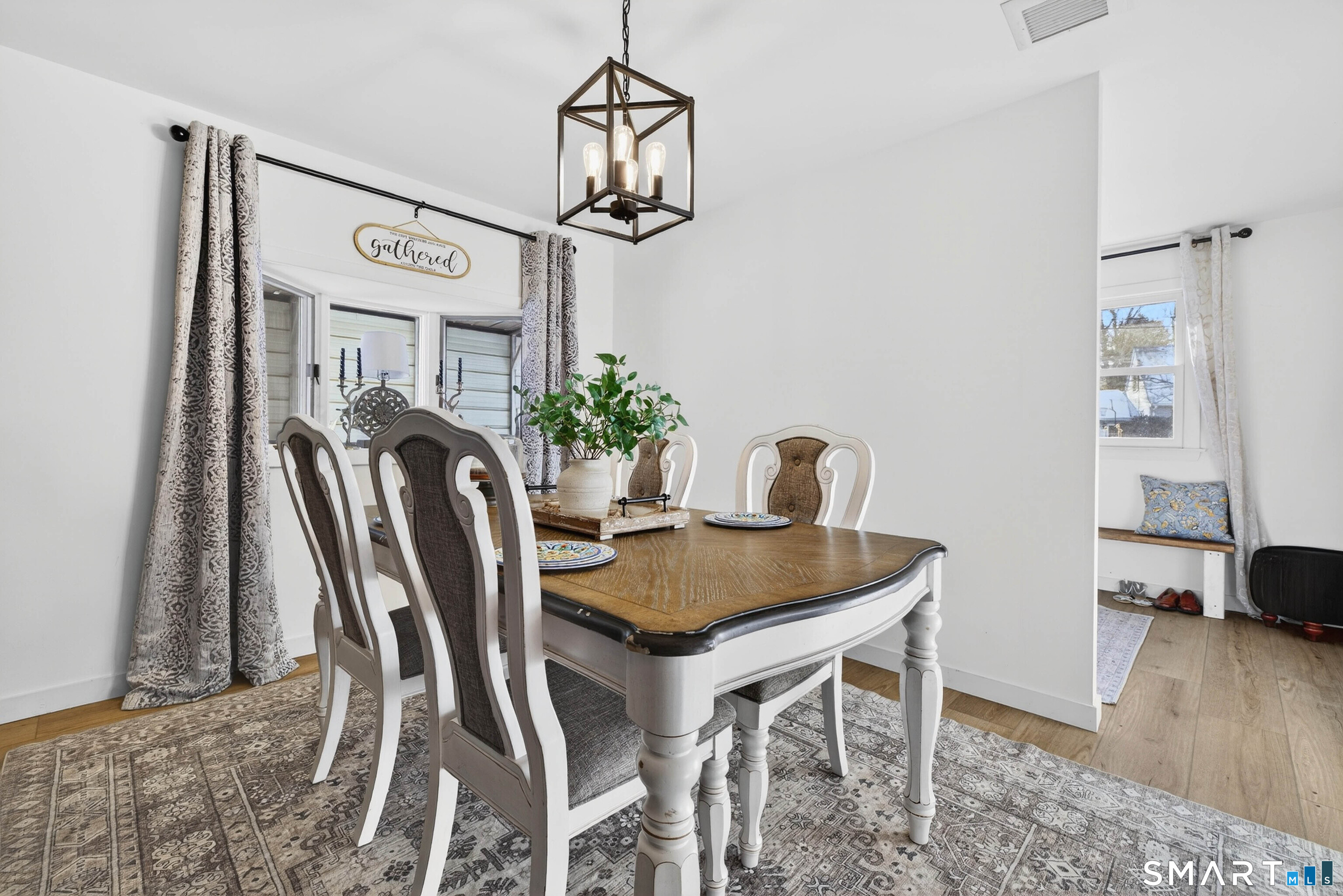 168 Park Avenue Colchester, CT 06415 - Photo 21 of 40 a view of a dining room with furniture and wooden floor