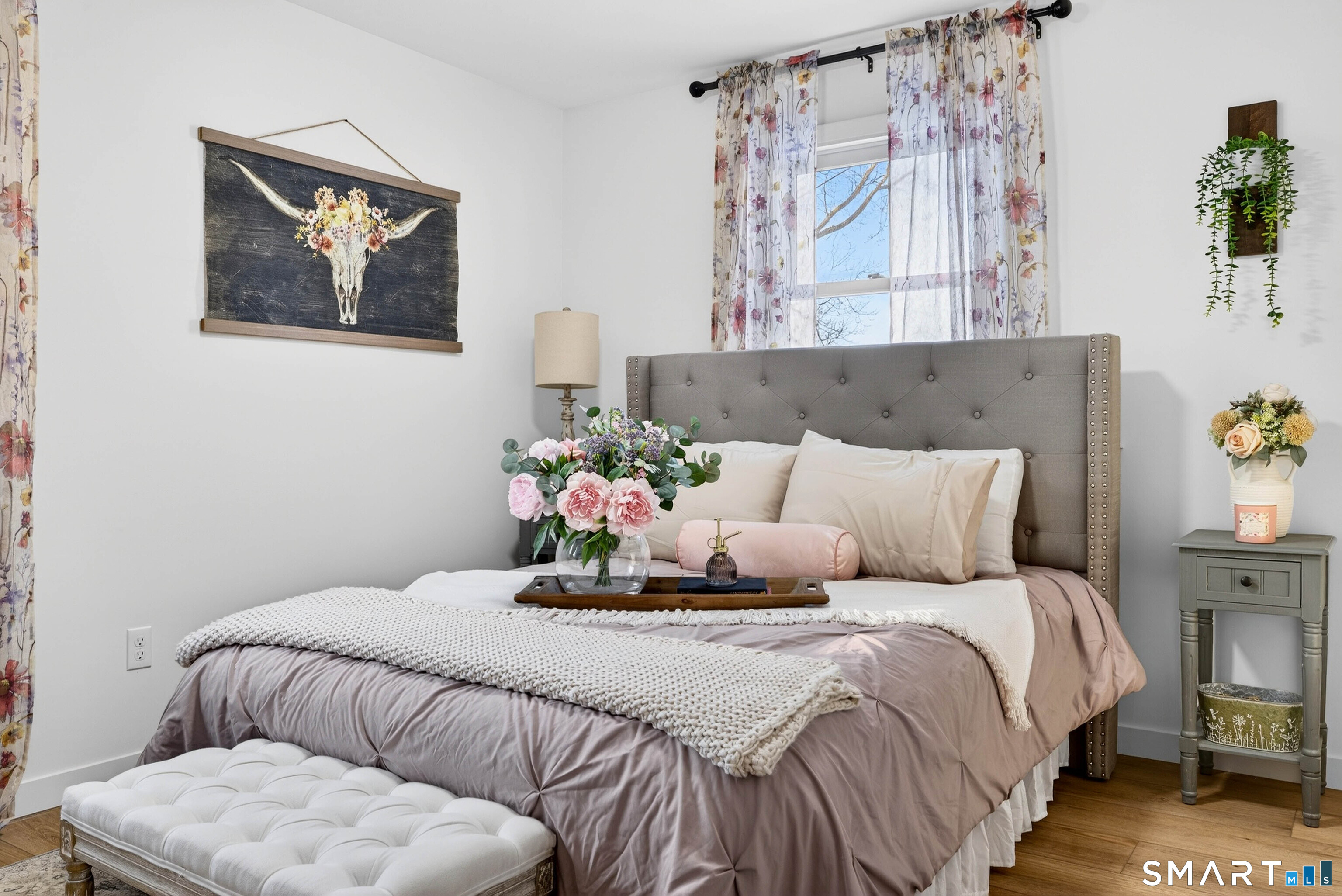168 Park Avenue Colchester, CT 06415 - Photo 27 of 40 a bedroom with a bed and painting on the wall