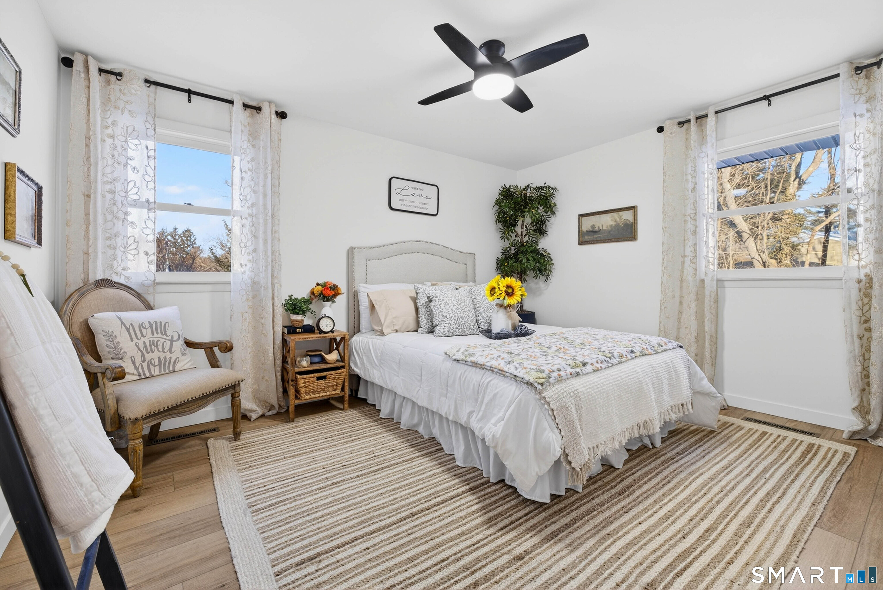 168 Park Avenue Colchester, CT 06415 - Photo 30 of 40 a bedroom with a bed a couch and a window