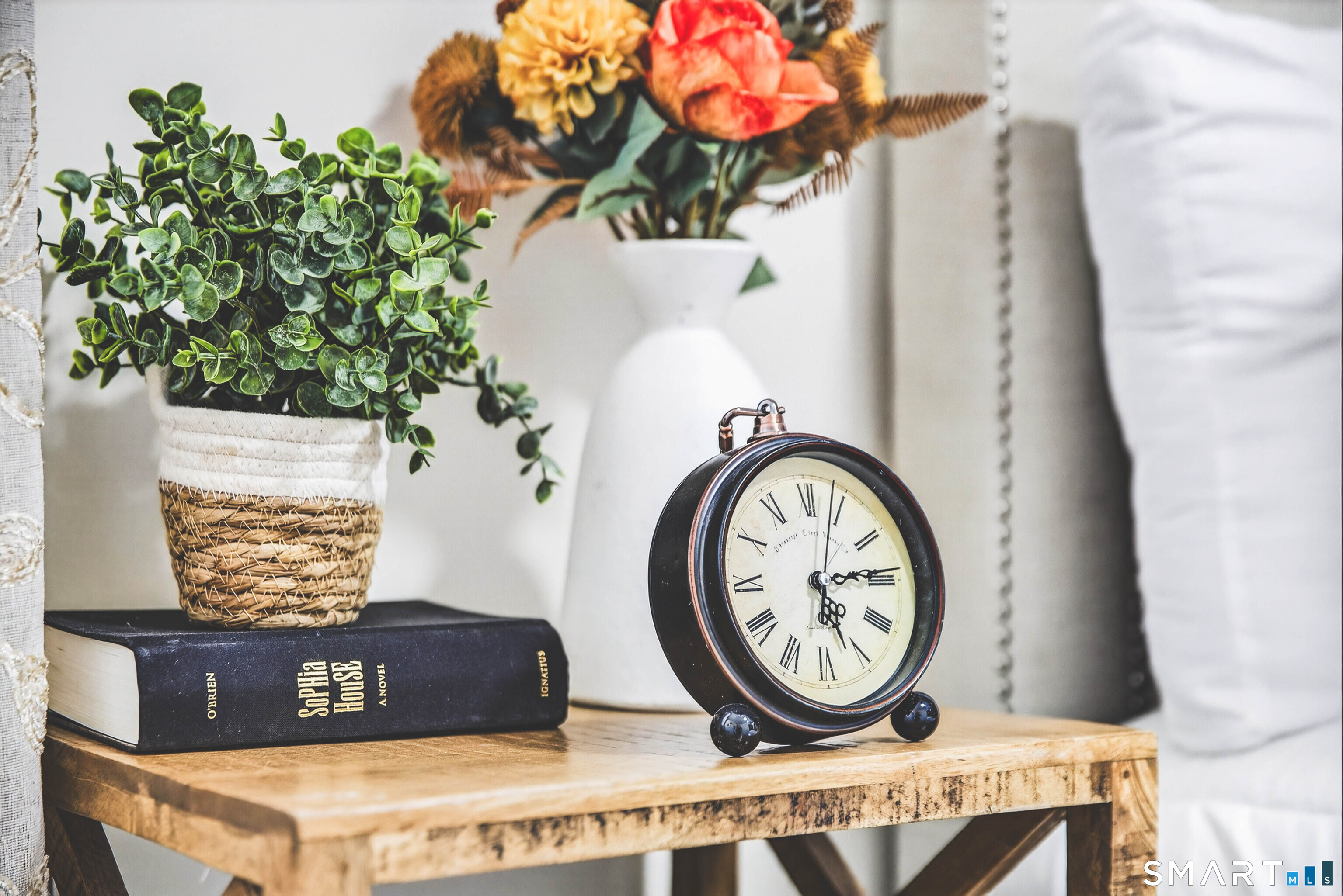 168 Park Avenue Colchester, CT 06415 - Photo 32 of 40 a picture of a wall with a potted plant and a clock on it