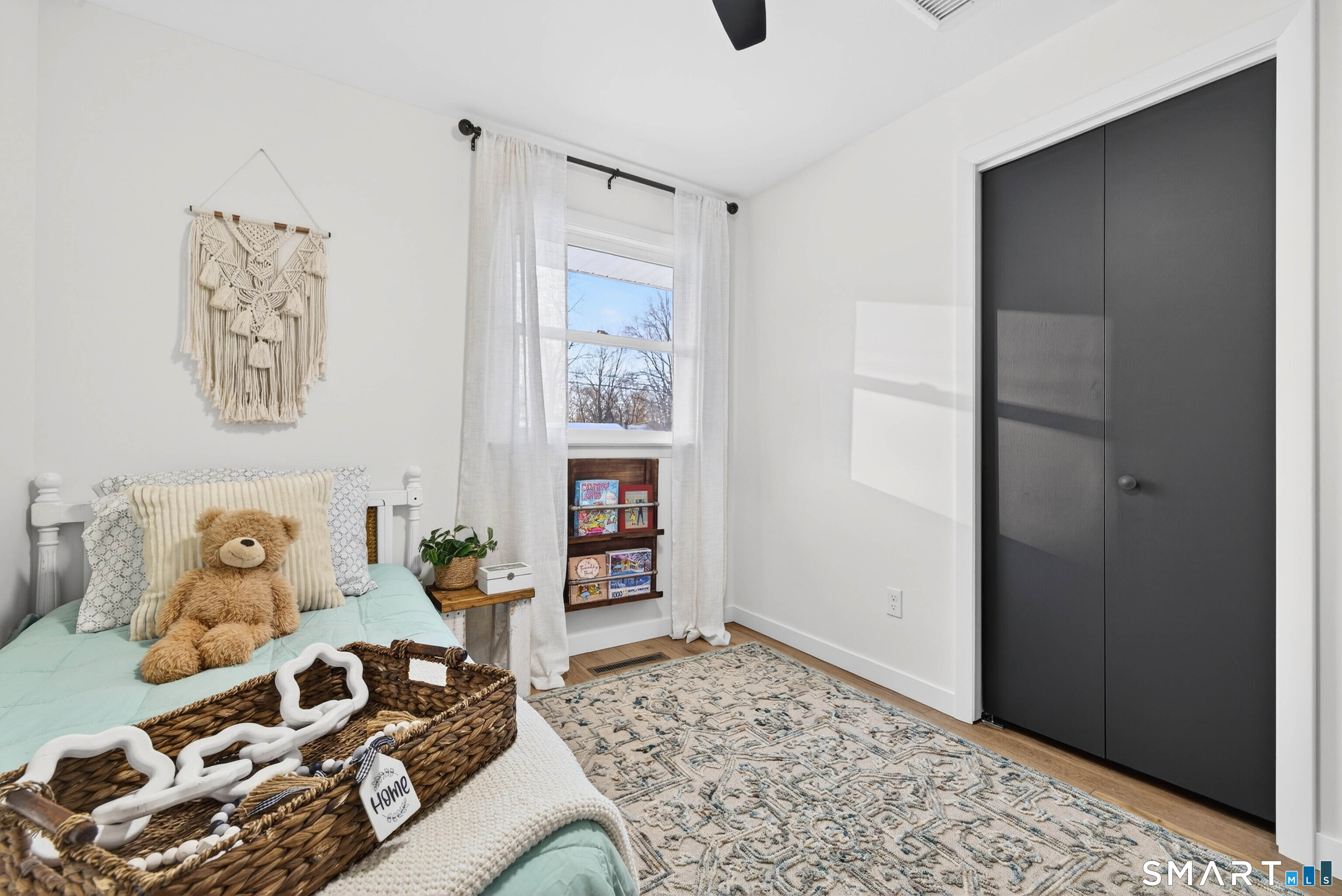 168 Park Avenue Colchester, CT 06415 - Photo 34 of 40 a bedroom with furniture and a window