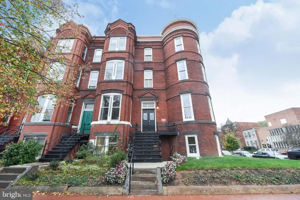 a front view of a multi story residential apartment building
