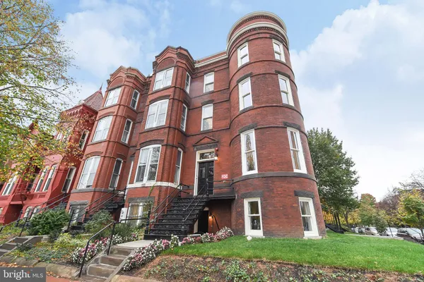 a front view of a multi story residential apartment building