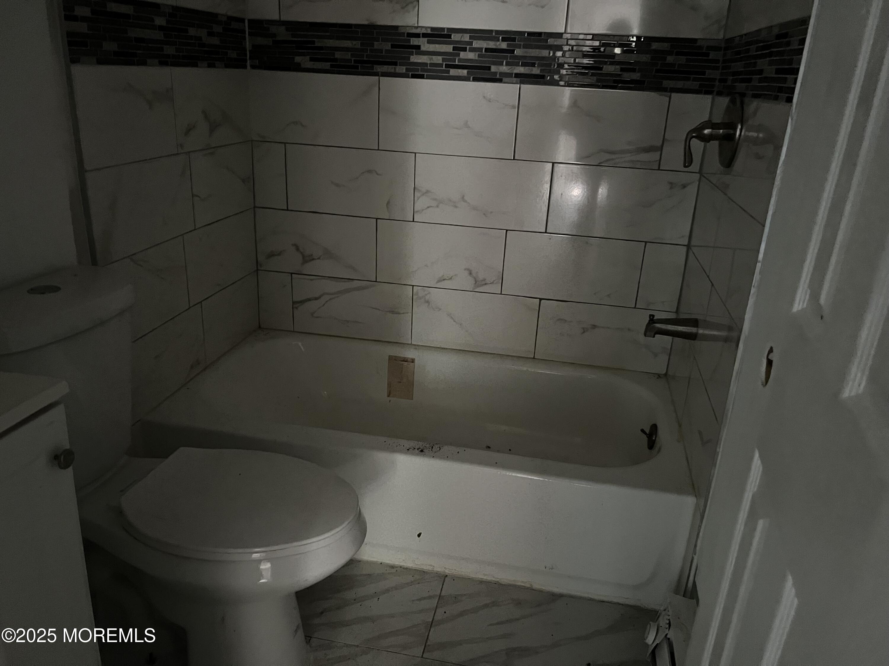 138 Disbrow Hill Road Millstone Township, NJ 08535 - Photo 21 of 33 a bathroom with a toilet and a shower