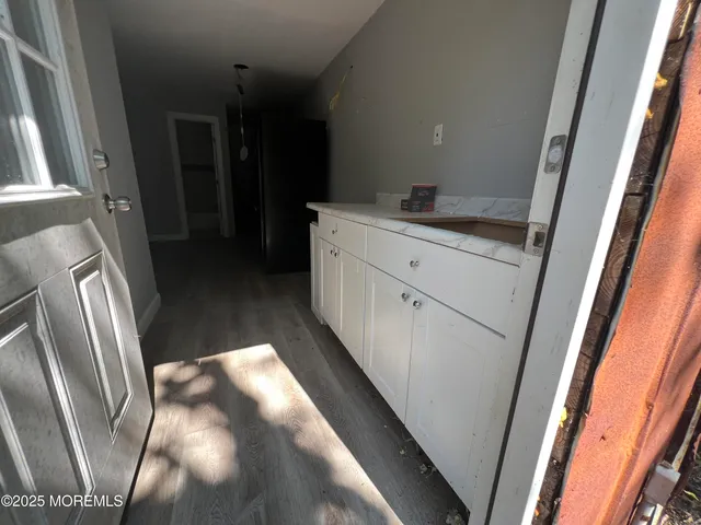 a view of hallway with stairs