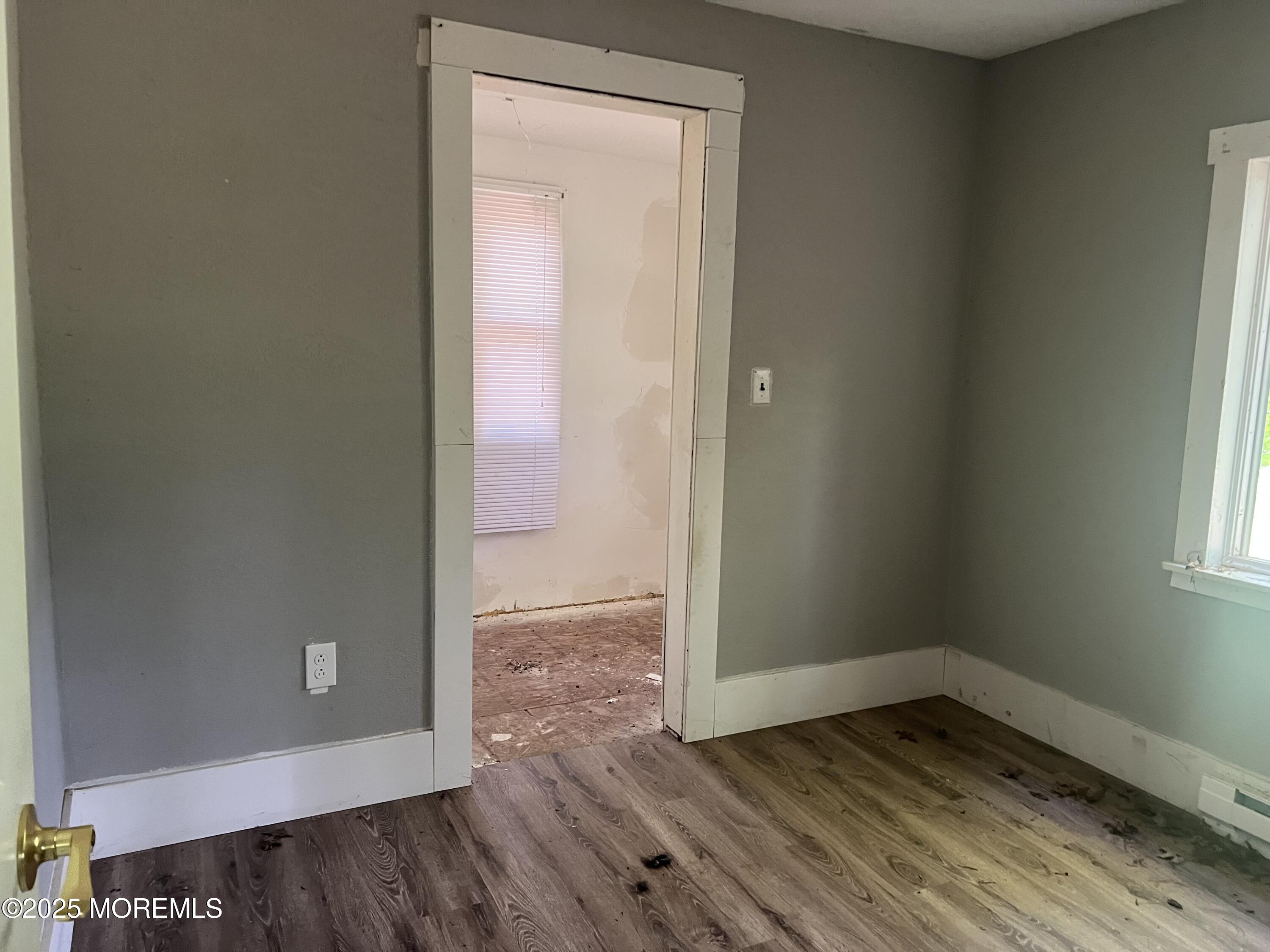 138 Disbrow Hill Road Millstone Township, NJ 08535 - Photo 10 of 33 an empty room with wooden floor and closet