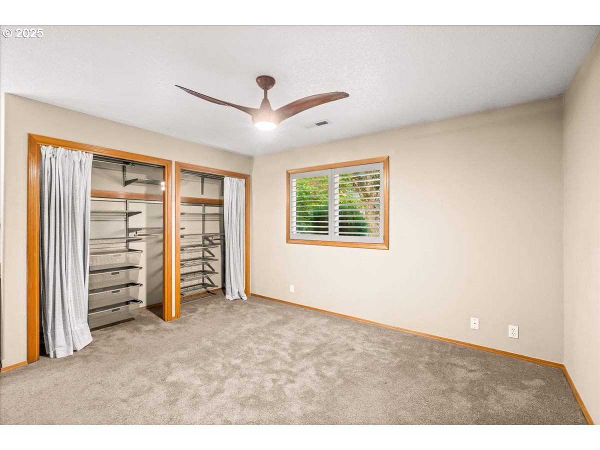 2108 B Street Forest Grove, OR 97116 - Photo 17 of 36 a view of an empty room with a window
