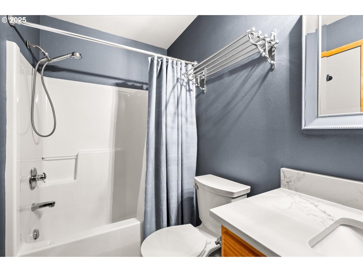 2108 B Street Forest Grove, OR 97116 - Photo 26 of 36 a bathroom with a sink toilet and shower