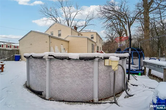 a view of a house with outdoor seating