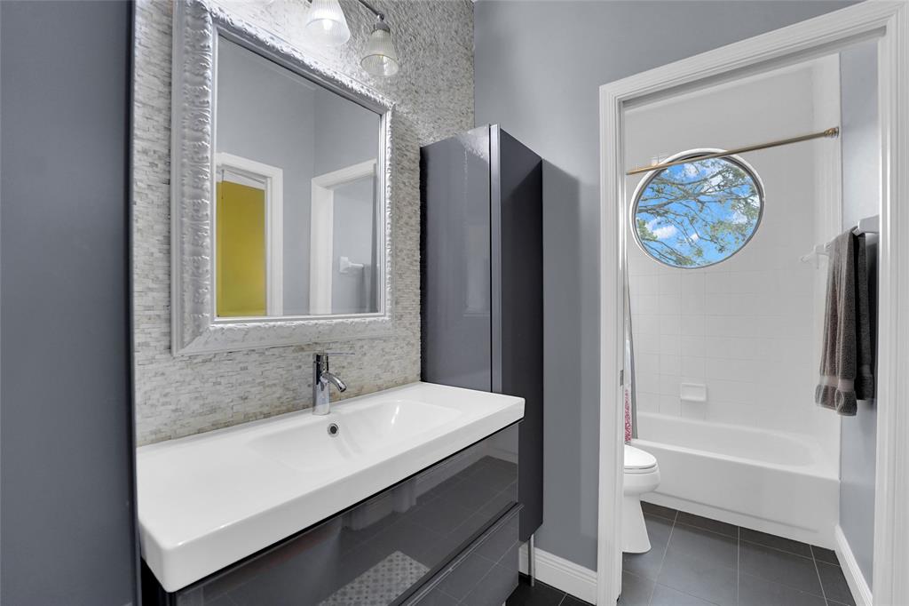 22280 Tupelo Place Boca Raton, FL 33428 - Photo 40 of 53 a bathroom with a bathtub and a sink