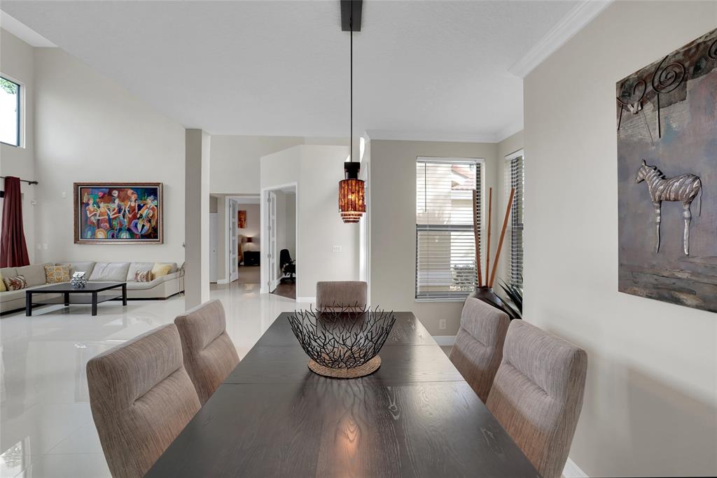 22280 Tupelo Place Boca Raton, FL 33428 - Photo 48 of 53 a living room with furniture and a wooden floor