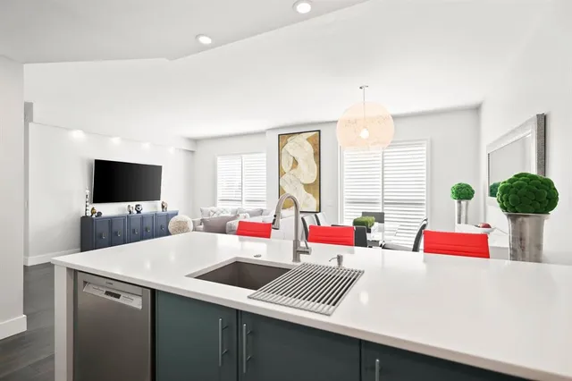 a room with furniture and a flat screen tv