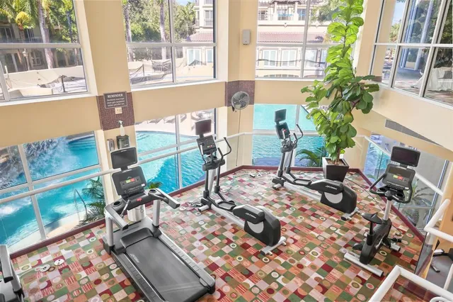 a view of front door with table and chairs