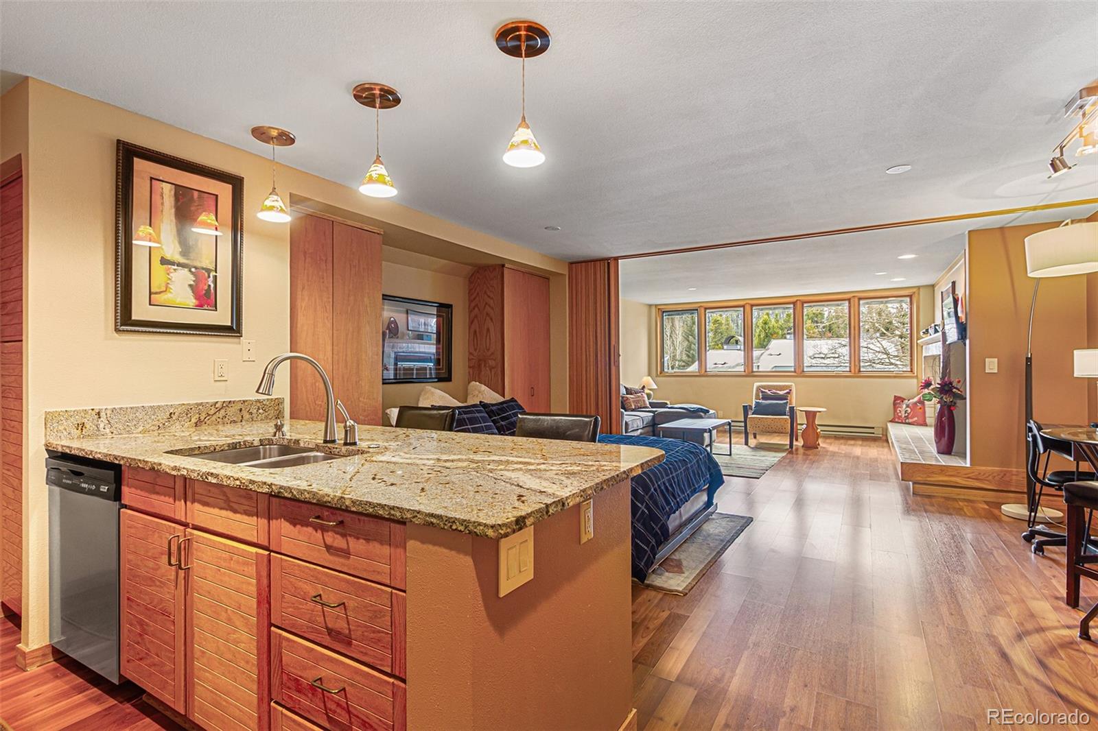 22864 Highway 6, Unit 107 Keystone, CO 80435 - Photo 3 of 20 a spacious bathroom with a granite countertop sink a mirror and next to a window