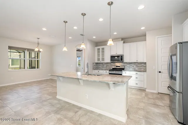 $728,900 | 7786 Millbrook Avenue, Melbourne, FL 32940