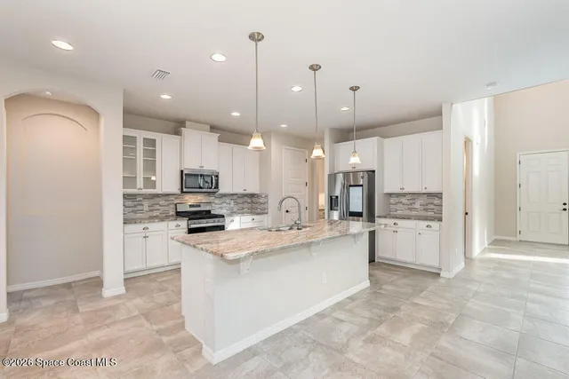 $728,900 | 7786 Millbrook Avenue, Melbourne, FL 32940