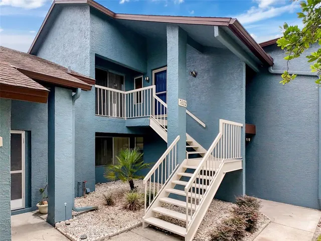 a view of an entryway with front door