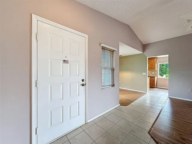 a view of entryway with front door