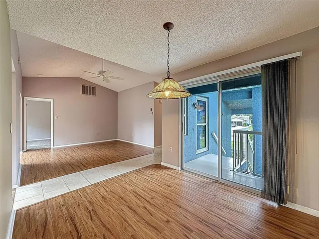a kitchen with a sink a counter top space and a window