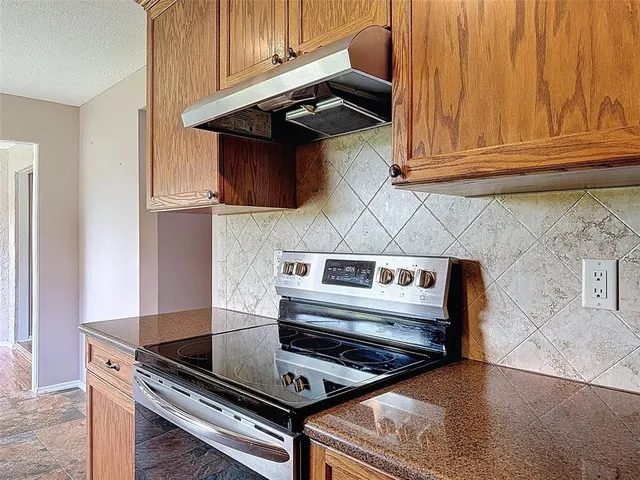 a bedroom with a bed and a flat screen television