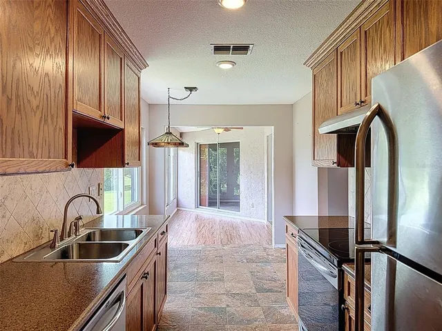 a bathroom with a toilet sink shower and mirror