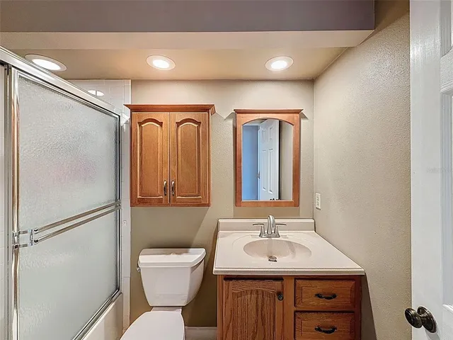 a view of storage and utility room with washer and dryer