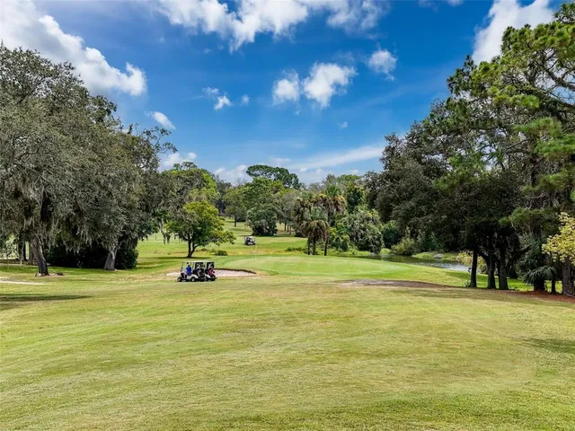 a front view of a house with wooden stairs