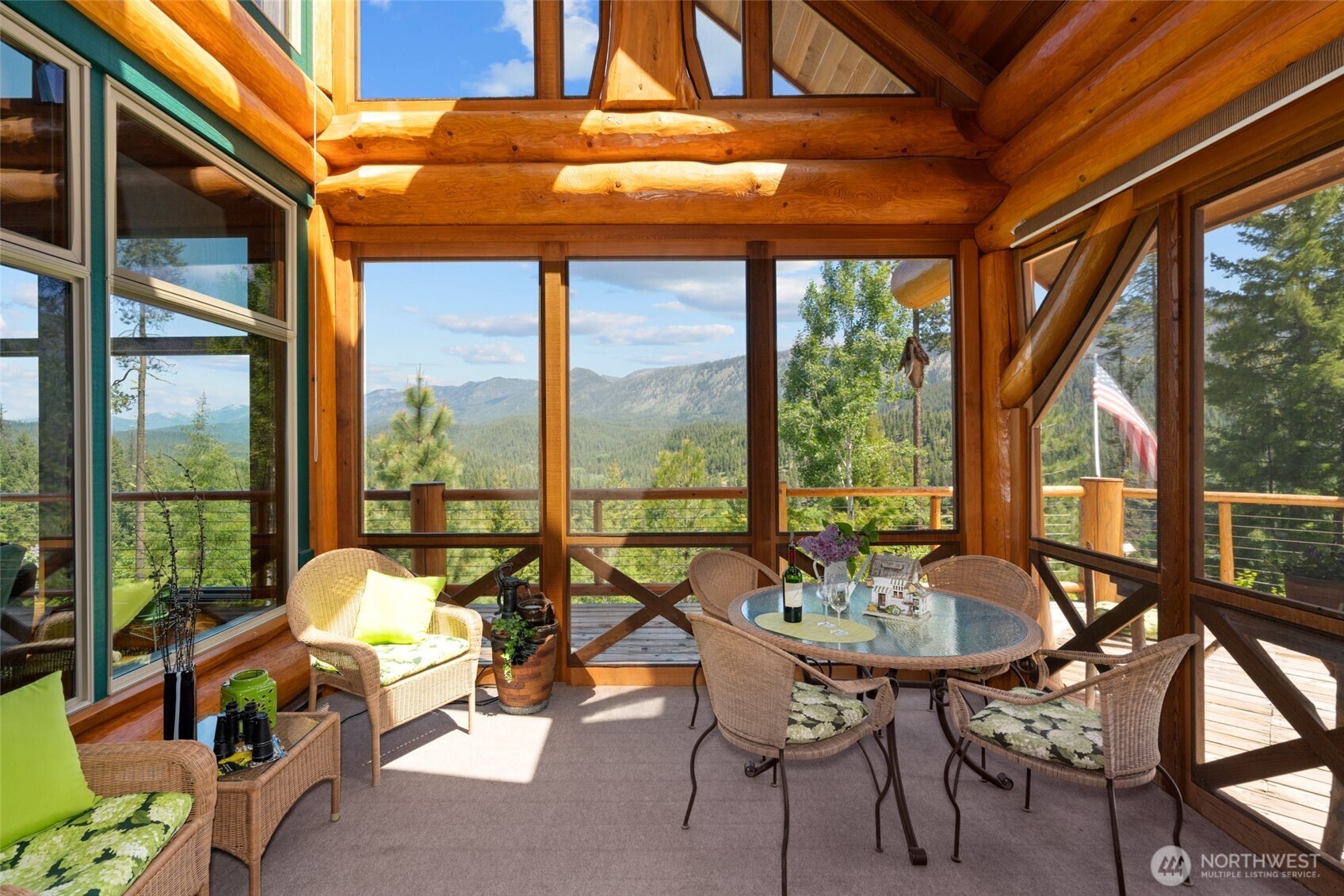 11411 Shugart Flats Road Leavenworth, WA 98826 - Photo 11 of 40 a view of an outdoor space with furniture and hardwood floor