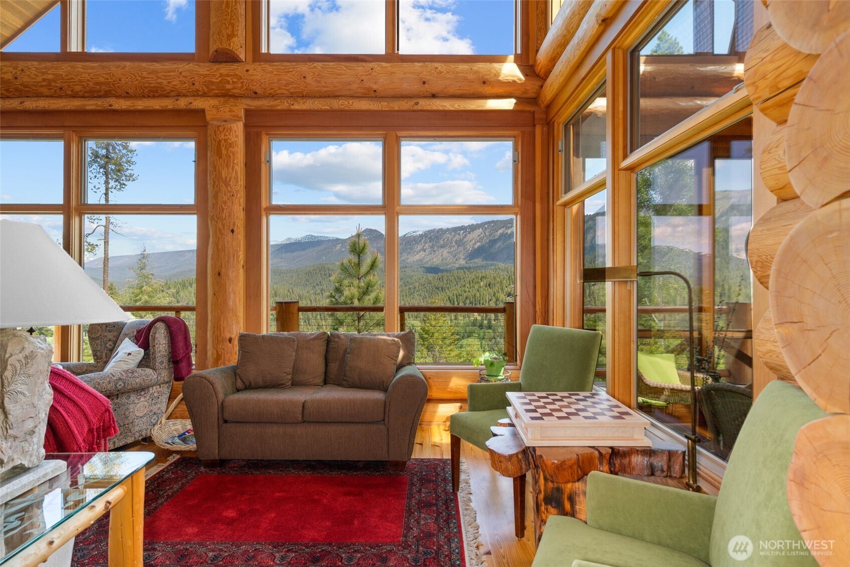 11411 Shugart Flats Road Leavenworth, WA 98826 - Photo 14 of 40 a living room with furniture a large window