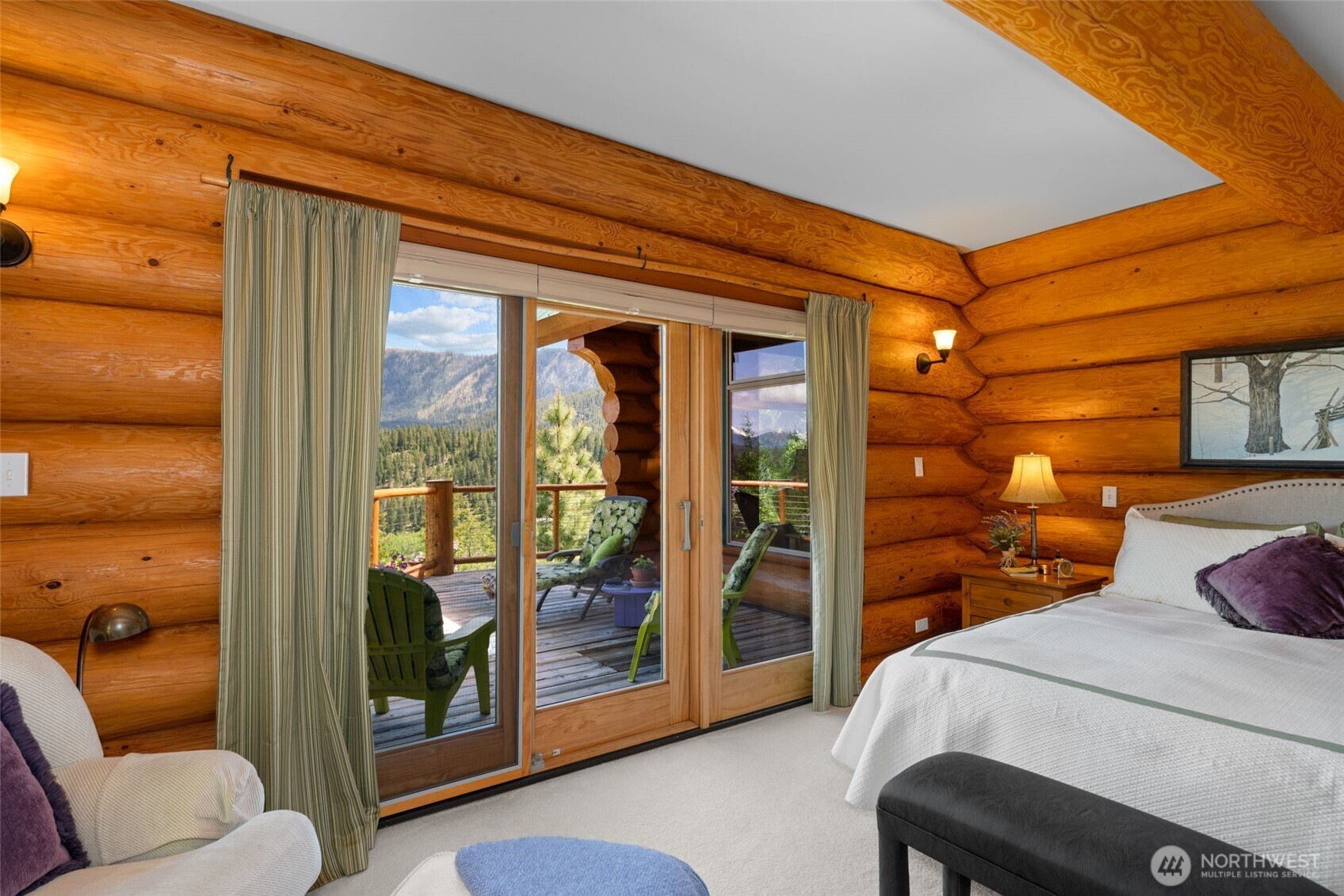 11411 Shugart Flats Road Leavenworth, WA 98826 - Photo 25 of 40 a bedroom with a bed and a balcony view