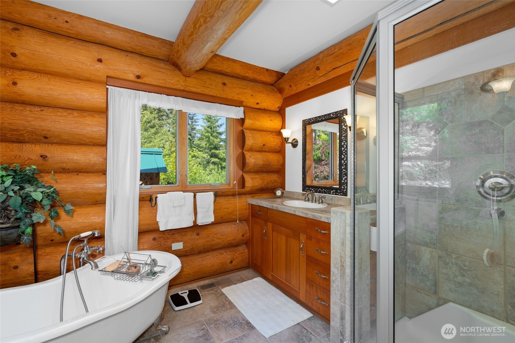 11411 Shugart Flats Road Leavenworth, WA 98826 - Photo 26 of 40 a living room with furniture and a large window