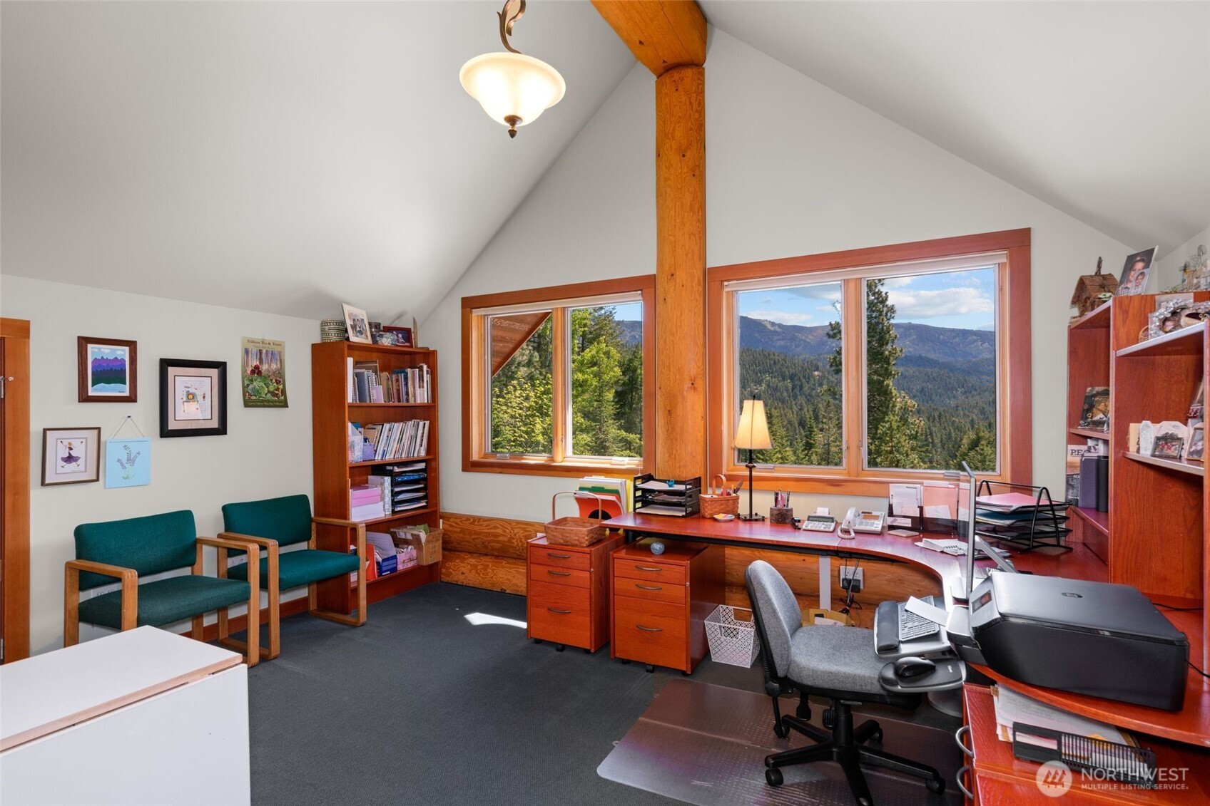 11411 Shugart Flats Road Leavenworth, WA 98826 - Photo 32 of 40 a bedroom with furniture and a large window