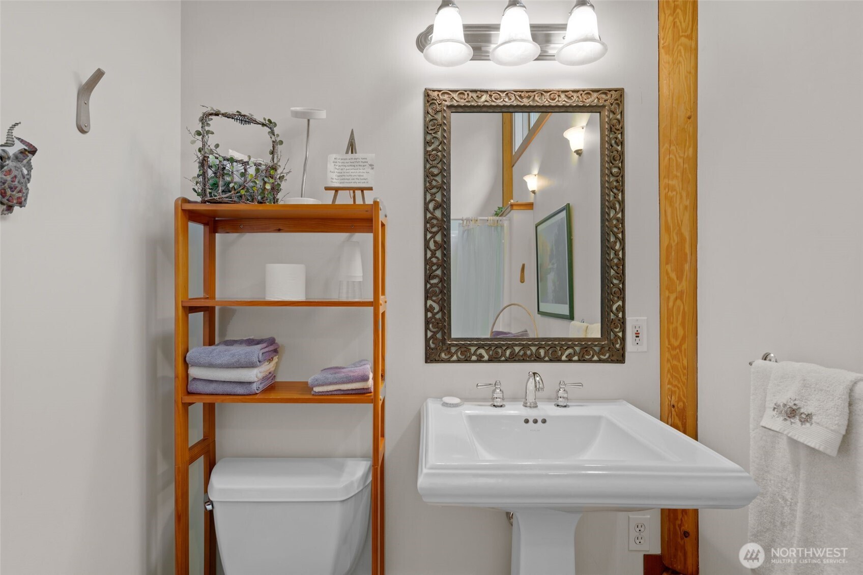 11411 Shugart Flats Road Leavenworth, WA 98826 - Photo 37 of 40 a bathroom with a sink a toilet and a mirror