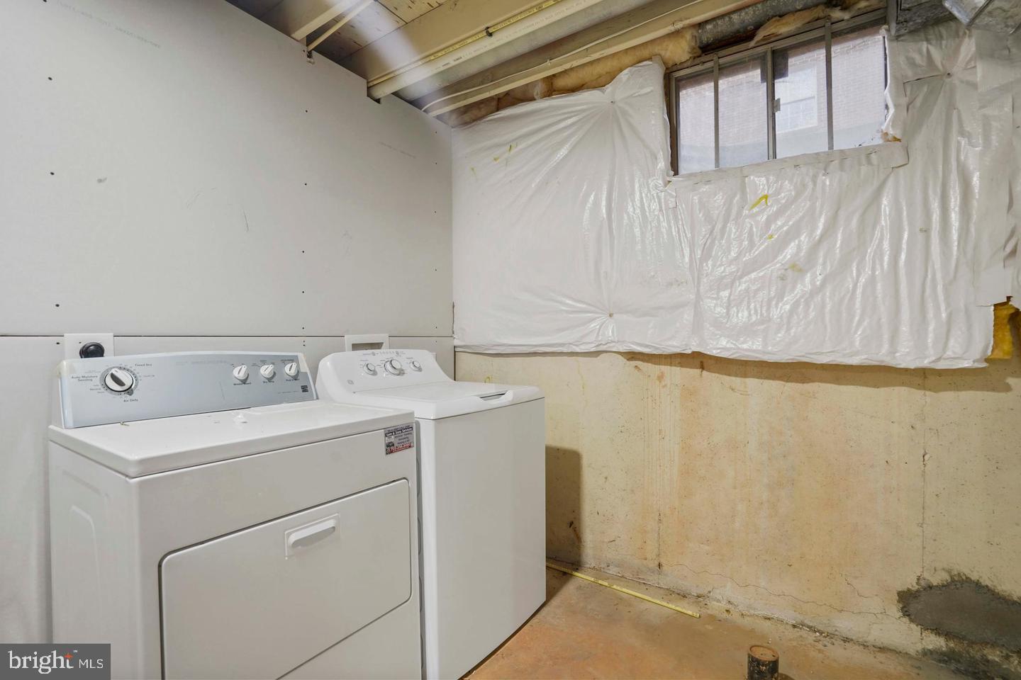 5105 Pheasant Road Fairfax, VA 22030 - Photo 29 of 32 Functional laundry space with natural light.