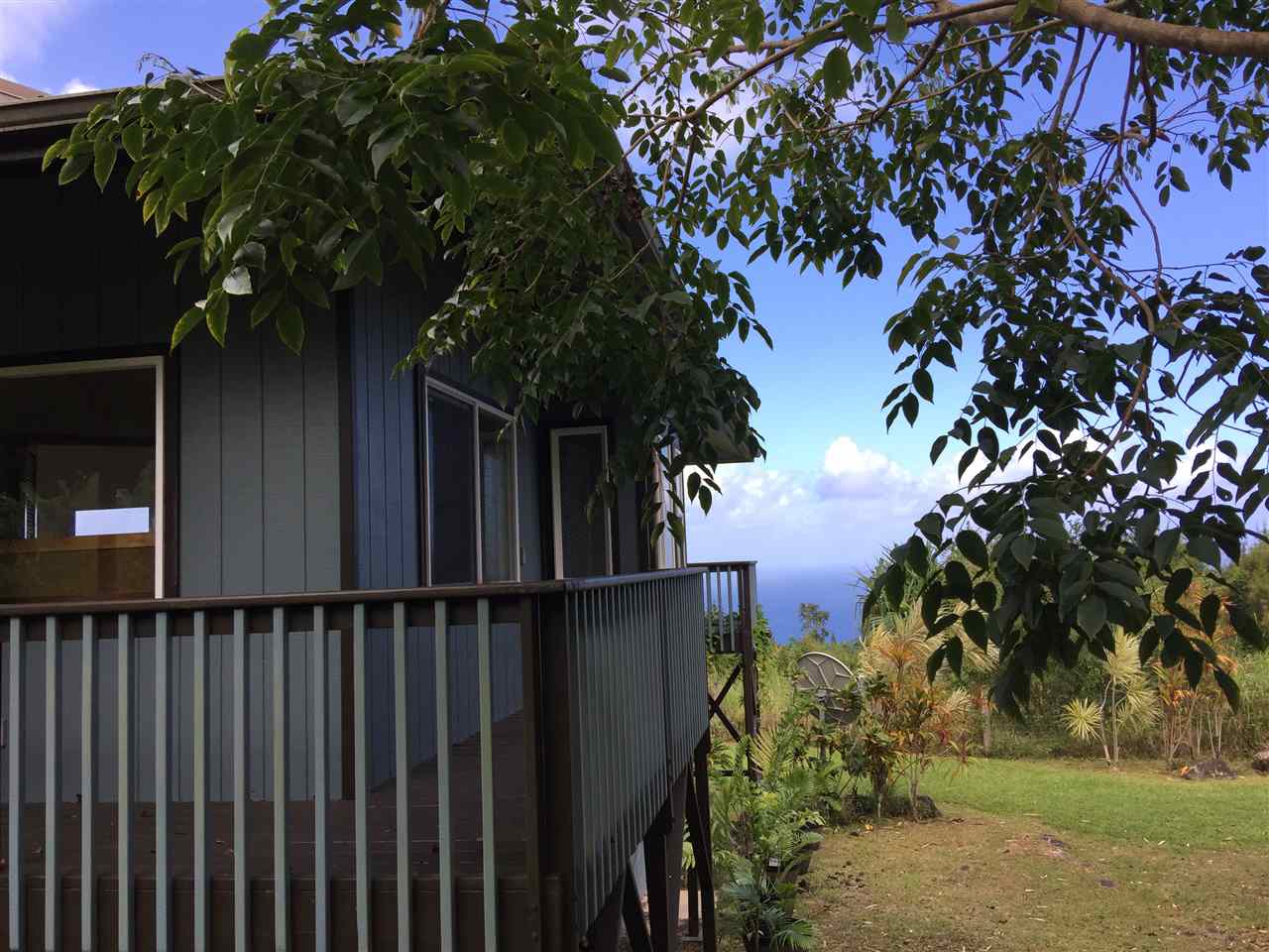 750 Kapia Road, Unit 36 Hana, HI 96713 - Photo 2 of 29 a backyard of a house with lots of green space