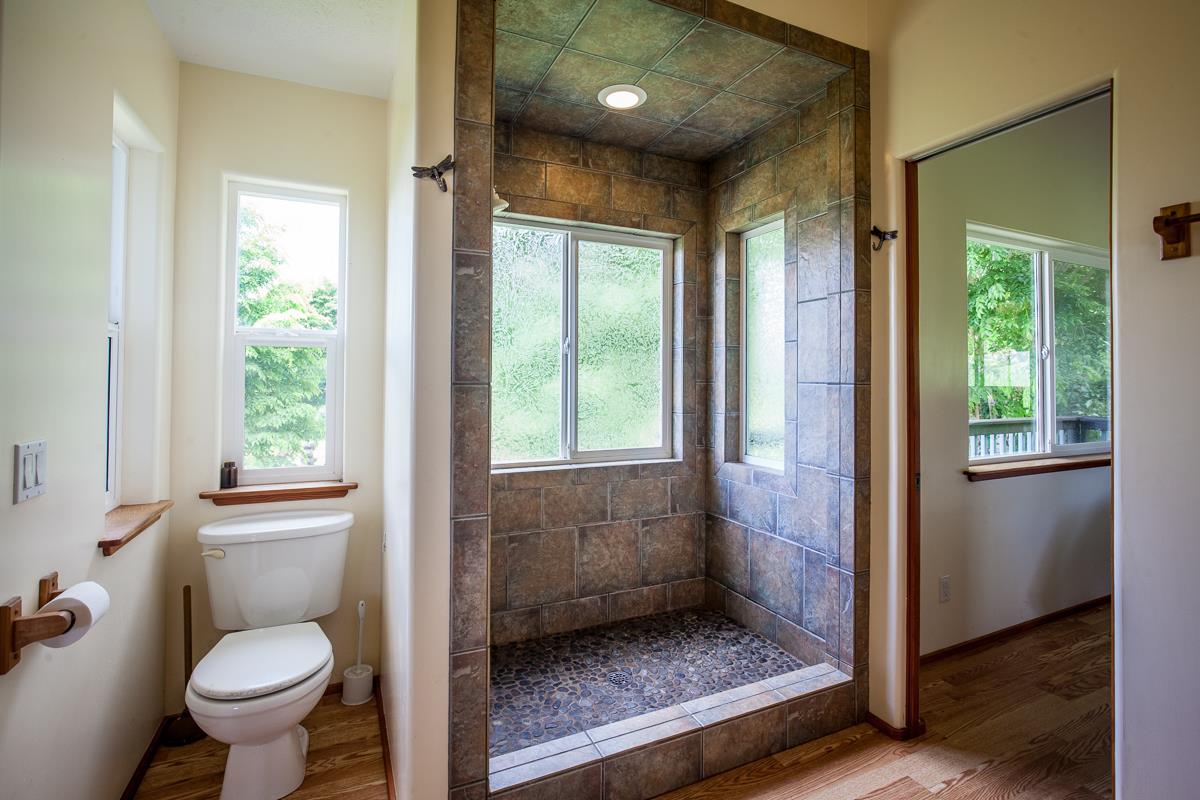 750 Kapia Road, Unit 36 Hana, HI 96713 - Photo 22 of 29 a bathroom with a toilet and a shower