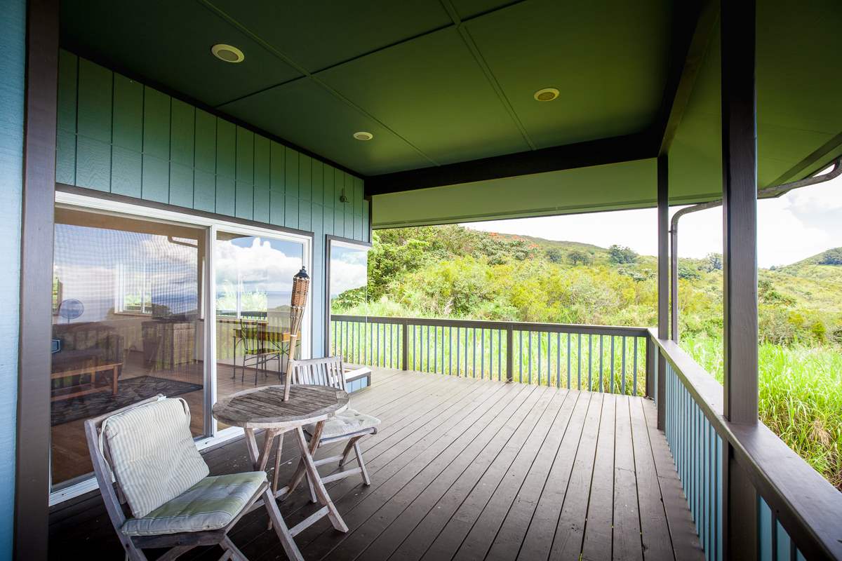 750 Kapia Road, Unit 36 Hana, HI 96713 - Photo 23 of 29 a view of a balcony with furniture and wooden floor