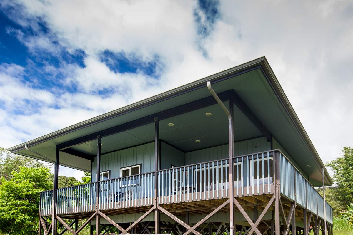 750 Kapia Road, Unit 36 Hana, HI 96713 - Photo 8 of 29 a roof deck with wooden floor barbeque oven and yard in the back