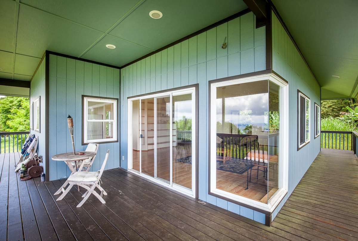 750 Kapia Road, Unit 36 Hana, HI 96713 - Photo 10 of 29 a living room with furniture and a floor to ceiling window