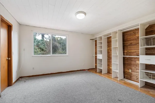 an empty room with windows