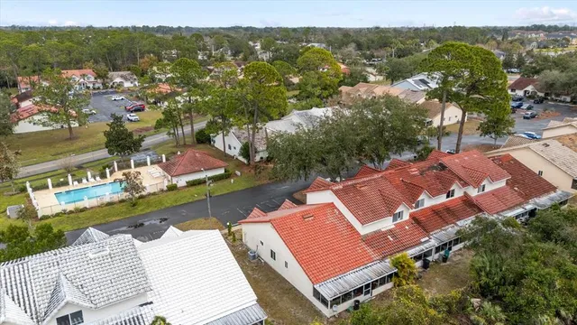 an aerial view of residential house with outdoor space and river