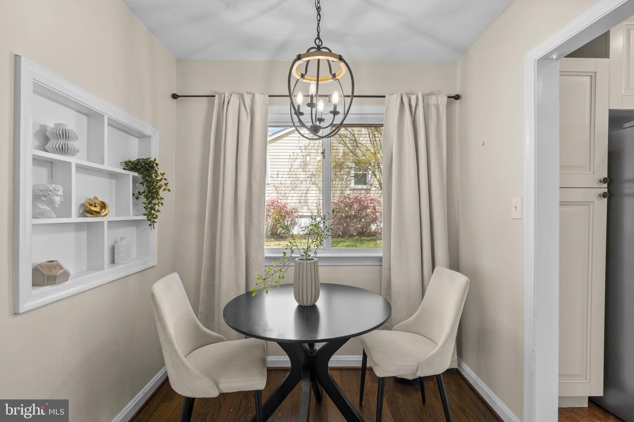 7005 Grove Road Alexandria, VA 22306 - Photo 11 of 52 a view of a dining room with furniture window and outside view