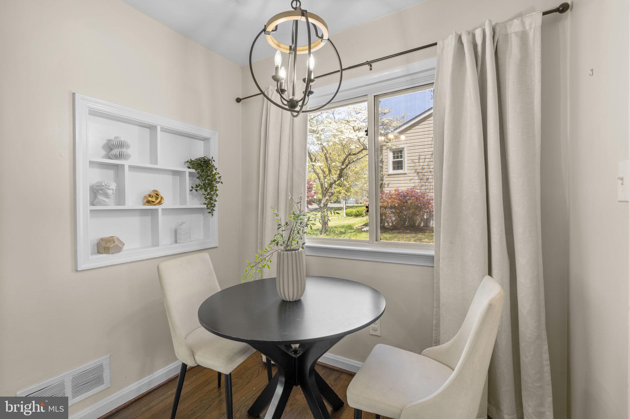 7005 Grove Road Alexandria, VA 22306 - Photo 13 of 52 a view of a dining room with furniture window and outside view
