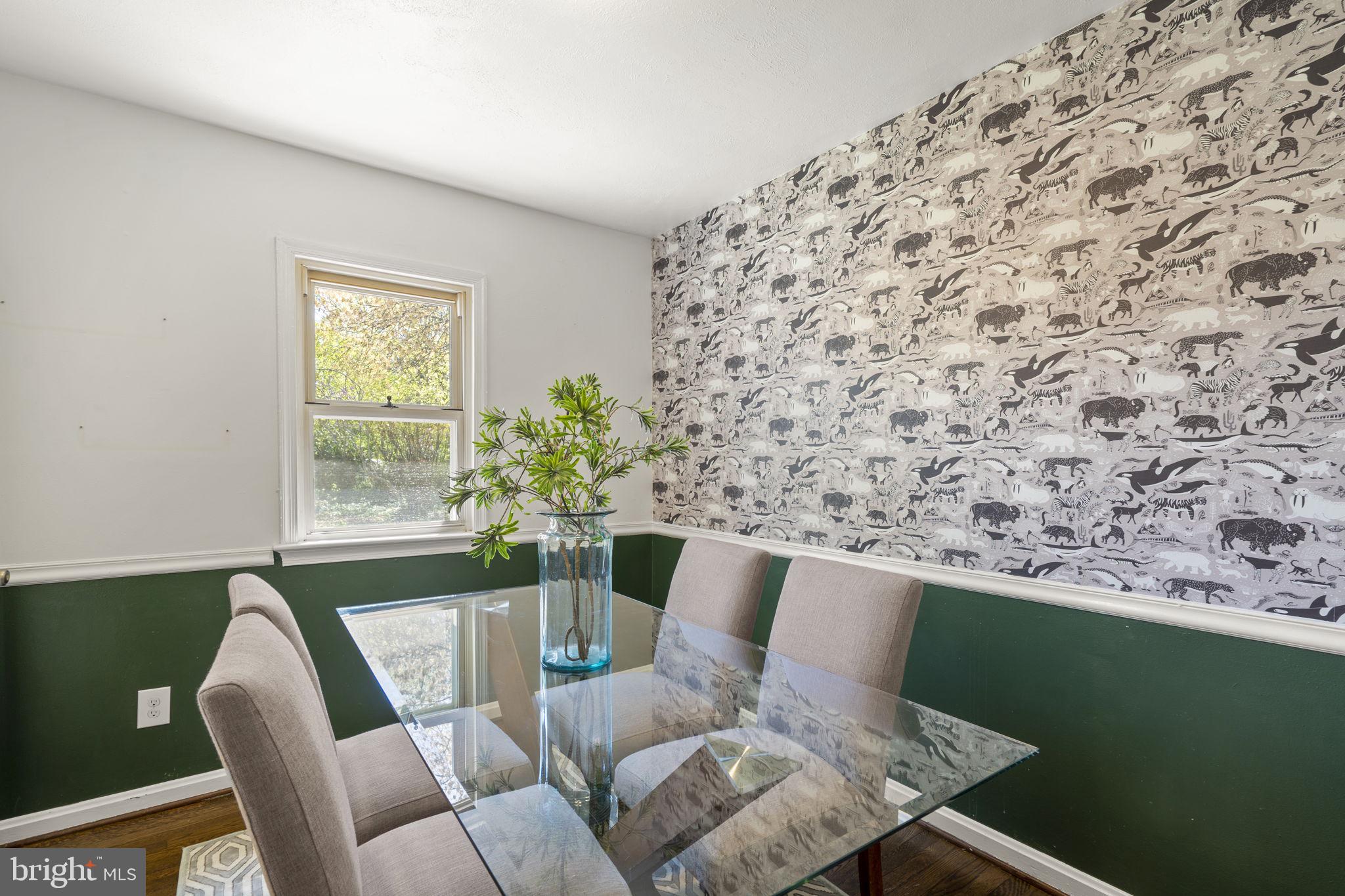 7005 Grove Road Alexandria, VA 22306 - Photo 27 of 52 a view of a dining room with furniture and a window